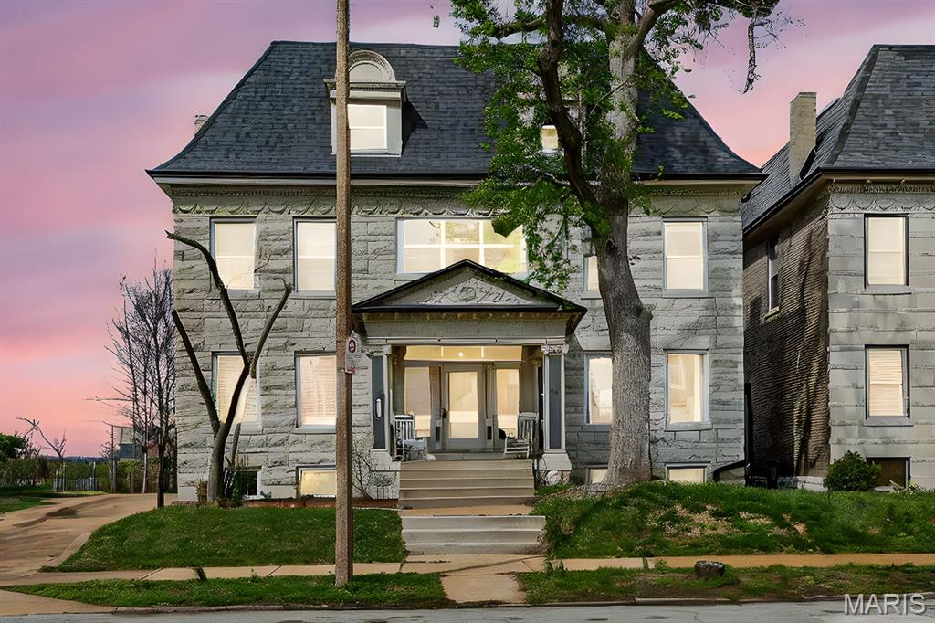 Discover timeless beauty, character, and elegance in this historic residence tucked away on a restricted-access street in the Central West End. This impressive three-story home features more than 4,500 sq feet, and is ideally situated just minutes from Forest Park, Washington University, and Barnes-Jewish Hospital. Built in the early 1900s, it has been thoughtfully renovated to blend classic architectural charm with modern comforts. This is a property you won't want to miss. Relax and unwind while barbecuing on the deck overlooking the backyard. The home offers 5/beds and 3.5/baths, including a luxurious primary suite with walk- in shower, dual vanities, and a custom closet. The second floor provides added convenience with a laundry room and beautifully designed built- in storage. The third floor features three additional generous bedrooms, full bath and ample storage space. Bring your story to life in this beautiful home.