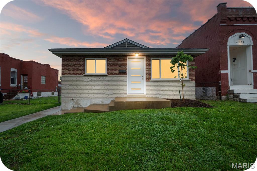 Explore your new walkable lifestyle from this completely reinvented 3-bedroom, 1-bath bungalow in the ever-popular Bevo neighborhood! Celebrating its 65th year, this charming home has been thoughtfully updated from top to bottom, blending classic character with modern peace of mind. Major improvements include a new roof, new windows, updated electrical with 200-amp service, some newer plumbing, new central heating and air conditioning, a new water heater, a beautifully renovated bathroom, and an updated kitchen featuring brand-new cabinets, countertops, refrigerator, microwave, and dishwasher. Freshly refinished hardwood floors add warmth and character throughout the spacious combined living and dining area and all three main-floor bedrooms. Whether you prefer a north-, east-, or west-facing bedroom, you'll have your pick. Step outside to a huge, fully fenced backyard — a dream for pets, gardeners, entertainers, or anyone who appreciates a little extra elbow room! A newly poured sidewalk leads to the 10' x 12' patio, the perfect spot for weekend barbecues, morning coffee, or simply taking in your surroundings. You'll also appreciate the private two-car parking pad and new retaining wall. Of course, living in Bevo means you may not have to fire up the grill at all. Just a short walk from your front porch, you'll find neighborhood favorites like The Stellar Hog, Das Bevo, Tim's Chrome Bar, The Silver Ballroom, Mariachi's II, Majeed Mediterranean, The Heavy Anchor, and countless other local dining and entertainment options. Nearby locally owned grocery stores along the Gravois corridor make everyday errands just as convenient. Downstairs, the basement offers endless possibilities for a future entertainment room, hobby space, workshop, or additional storage. A new drain and sump pump system helps keep the space dry and ready for whatever you envision. Move right in and spend less time worrying about projects and more time deciding how you'll make that expansive backyard your own.