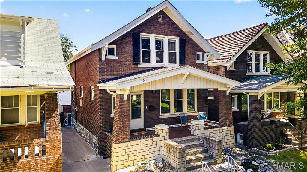 Enjoy summer evenings on the spacious covered front porch of this beautiful South City Craftsman home. Step inside to a large family room showcasing original woodwork, a decorative fireplace, and stunning stained-glass windows. Hardwood floors continue throughout the main level and into the generous dining room, featuring a bay window with a built-in window seat.
The updated kitchen offers modern convenience including Gas Cooktop, Custom Cabinets, Granite Countertops. Upstairs, you'll find three bedrooms and an updated full bathroom. The spacious primary bedroom includes two walk-in closets, providing exceptional storage.
Major improvements include some updated windows, HVAC, electrical systems, and a brand-New Roof and Gutters installed in May 2026. The unfinished walk-out lower level offers abundant storage space and future potential.
Outside, enjoy a fenced backyard and a Detached 2 Car Garage. Conveniently located within walking distance of local favorite Clementines!