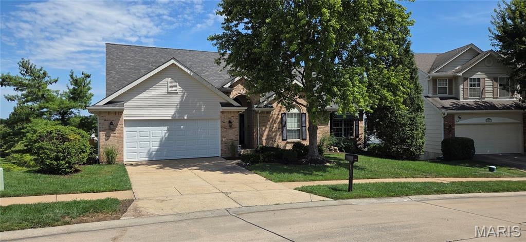 Welcome home to 11479 Daykin Drive, a beautifully refreshed Atrium Ranch with a newer roof and HVAC in Moorland Estates. Enjoy fantastic curb appeal, a peaceful setting, and scenic lake views from nearly every window. Inside, the bright, open layout features brand-new premium Luxury Vinyl Plank flooring throughout the main level, creating a modern, cohesive look with excellent durability. Spacious formal and casual living areas, a gas fireplace, large windows, and abundant natural light make the home feel warm and inviting. The main living area opens to an expansive lakeside deck with a custom retractable awning, perfect for outdoor dining and entertaining. A premium under-deck drainage system keeps the lower-level patio dry, even on rainy days. The spacious primary suite includes a private en-suite bath, with three additional bedrooms and two more full baths. The finished lower level features another gas fireplace and flexible space for a recreation room, home gym, media room, office, or more. Conveniently located near the airport, hospitals, shopping, dining, entertainment, schools, and major highways. A hidden gem offering space, updates, lake views, and an excellent St. Louis County location!