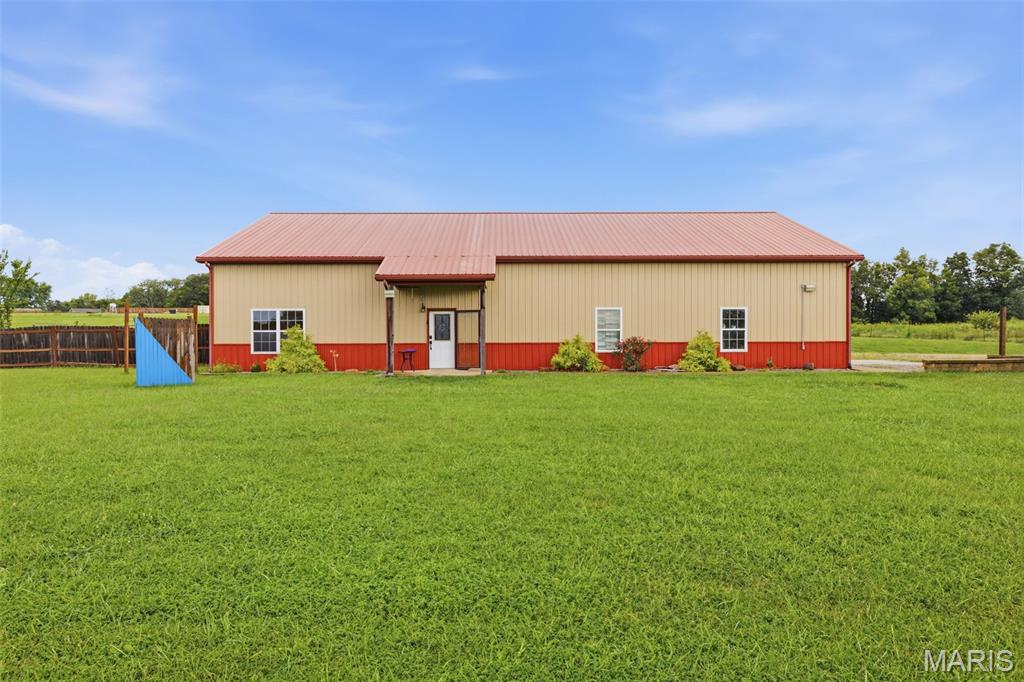 Discover an inviting home at 8041 Highway D, BNNTRR, MO 63628, built in 2011. This single-family residence is ready for you to move in and begin your next chapter, offering a perfect blend of comfort and convenience. The heart of this home is its open-plan kitchen, designed for both culinary exploration and social gatherings. It features sleek stainless steel appliances and a functional island, seamlessly connecting to the living room for effortless entertaining and daily life. With three well-appointed bedrooms and two bathrooms, this residence provides ample space for relaxation and privacy. Each room is thoughtfully designed to create a comfortable and serene atmosphere. Beyond the main living areas, a dedicated laundry room simplifies daily chores, while a versatile workshop offers space for hobbies or projects. Step outside to the patio, an ideal spot for enjoying the outdoors and creating lasting memories. This property is an exceptional opportunity to embrace a lifestyle of ease and enjoyment.