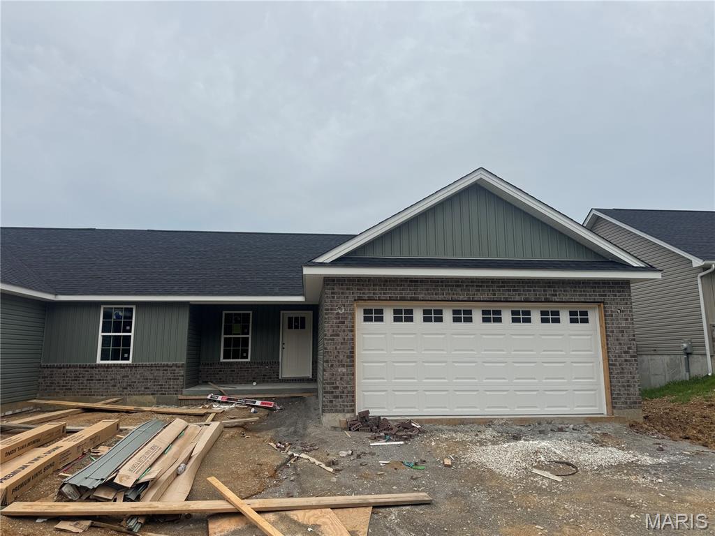 Move in your new home this summer! Welcome to Grindstone Grove in Moscow Mills. Beautiful under construction ranch villa/duplex located on a nice lot has all the bells and whistles. Each home is designed for personal privacy, loaded with high quality finishes, and built by one of the best custom builders in the area. Your next home is 1216 sq ft, 3 bedroom, 2 bathroom, oversized two car garage and full walkout basement. The custom type finishes include granite countertops, stainless steel appliances, luxury vinyl plank flooring in main living area, spindled staircase railing, vaulted living room and kitchen, large center island, ceiling fans in all bedrooms and living room, can style lights, brush nickel finishes including shower door in master, and much more. Grindstone Grove is just off quiet Railroad Street with high speed Gateway Fiber internet, no monthly HOA fee, new concrete streets, street lights, and will have sidewalks throughout for homeowner safety. Home qualifies for zero down USDA, zero down VA, & FHA. Agent owned. Estimated completion for late July move in. Add a 12x12 treated wood deck for a total purchase price of $286,000.