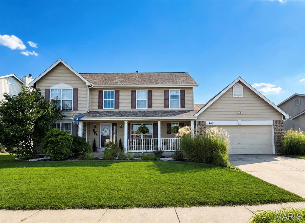 OPEN HOUSE SATURDAY 9/12. Welcome to 305 Valley Bluff Dr, where inviting spaces, thoughtful updates and a convenient Wentzville location come together in this spacious 4-bedroom, 2-story home. A full covered front porch sets the tone, opening to a dramatic 2-story foyer flanked by a versatile den accented with columns and a formal dining room with wood flooring. The heart of the home is the spacious Great Room featuring a woodburning fireplace and beautiful 5-window bay that fills the space with natural light. The adjoining kitchen offers 42-inch cabinetry, a pantry and plenty of workspace, while the breakfast room features a French-door bay leading directly to the backyard—creating an easy flow for everyday living and entertaining.

Step outside to a spacious, usable backyard surrounded by tall white vinyl privacy fencing. A generous patio provides plenty of room for outdoor dining, grilling and gathering, with additional lawn space to enjoy. A main-floor laundry and powder room add everyday convenience.

Upstairs, the primary suite offers a relaxing retreat with a large walk-in closet and private bath featuring dual vanities, soaking tub and separate shower. Three additional bedrooms and a full hall bath complete the upper level. Need even more room? The finished lower level adds a large recreation area plus an additional half bath—ideal for movie nights, hobbies, entertaining, a home gym or flexible living space.

Major improvements include a NEW furnace and A/C in 2026, newer roof in 2023, 200-amp electrical panel and fresh paint, allowing buyers to move in and make the home their own.

Located near Wentzville Parkway and the area's growing collection of shopping, dining and recreation, with convenient access to Wentzville Rec Center, Rotary Park, area trails and community events. Enjoy the combination of neighborhood living, outdoor recreation and everyday conveniences that make the Wentzville area such a popular place to call home.