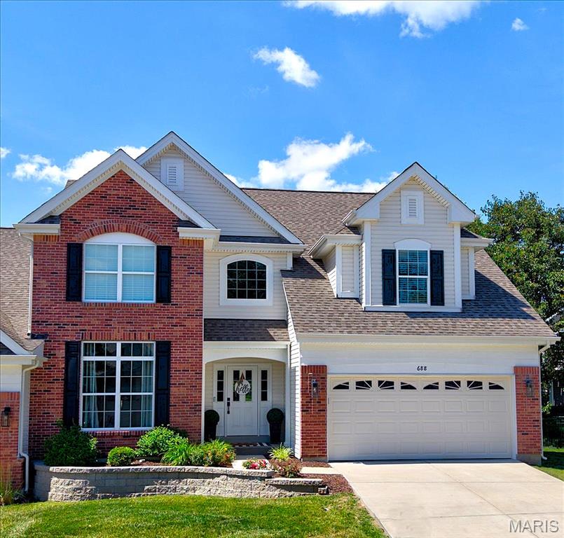Exceptional 3 Year New Luxury 1.5 Story Home!  Located in Highly Desired neighborhood of The Bluffs in The Legends.  This stunning villa offers 2656 sq ft w/3+ Beds & 3 Full Baths.  Step inside from the covered porch to the warm luxury vinyl plank flooring, soaring 9' and 11' foot ceilings and optimal open-floor plan.  The bright white chef's kitchen features quartz counters, stainless steel appliances, gas range, LOTS of custom cabinetry w/soft close, island, coffee bar and open view to family room.  Breakfast room is great size and offers a lovely view of the fantastic large corner lot.  An expansive family room/formal dining area is drenched in natural light from the wall of windows.  The elegant gas fireplace is framed by beautiful built-in bookcases with extra storage cabinetry.  The spacious primary with bay window is located on the main floor for added convenience.  Luxury primary bath offers large double vanity, custom shower, water closet, walk-in closet.  Main floor also has an office/study which can serve as an additional main floor bedroom, full bathroom w/tub/shower and laundry room.  UL boosts a mezzanine area which can be used a study/office/rec area, 2 nice size bedrooms and 2nd full bathroom w/tub/shower.  Full unfinished lower level is ready for your finishing touches for extra living space and has egress window and 3 piece rough-in.  Other Exceptional features include zoned HVAC, exquisite lighting, newer neutral paint, attached 2 car garage and composite deck off of family room with steps to landing/yard area.  Newer refrigerator in kitchen, newer washer & dryer STAY too.  Fantastic amenities - ALL Landscaping, maintenance of driveways and sidewalks, snow removal and de-icing for dwelling, exterior maintenance of siding & roofs and exterior pest control and some maintenance included in the monthly fee & beautiful sparkling pool for those hot summer days, tennis courts, sand volleyball court and playground with Legends South annual fee of $1000 .  Very convenient location.  Near all desired conveniences.  Don't miss your rare opportunity to own this incredible property that offers it all!