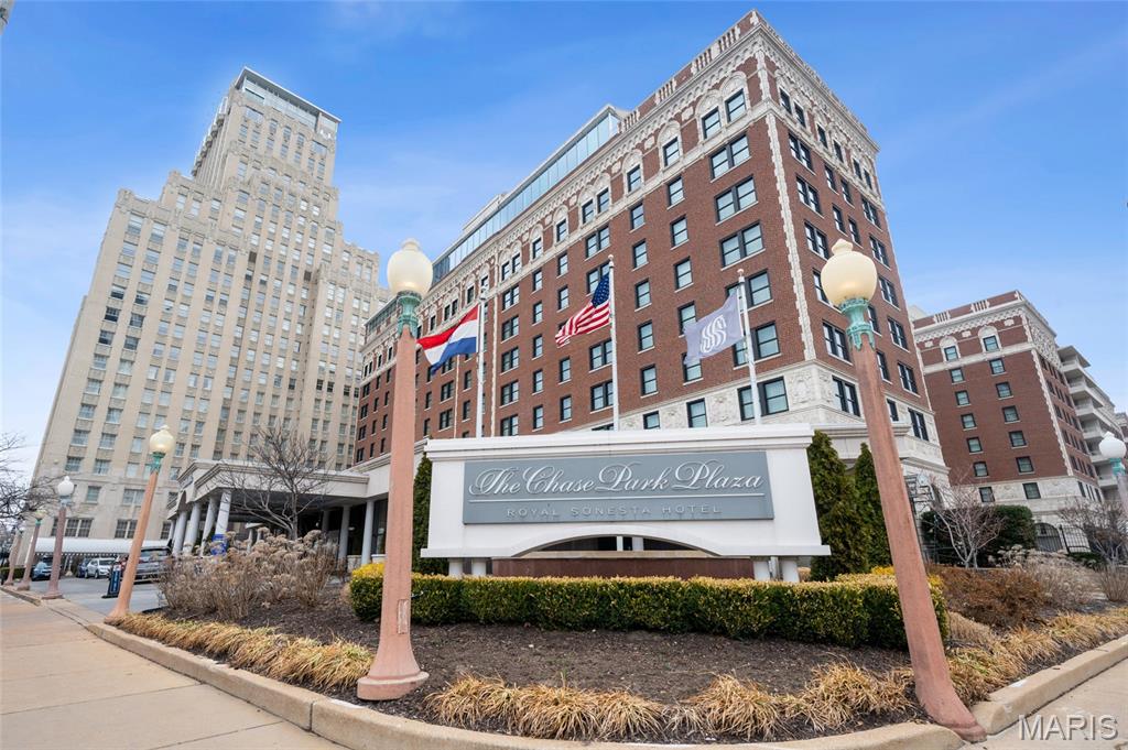 Absolutely stunning full service condo with incredible panoramic views of Forest Park at the Chase Park Plaza! 1 bedroom, 1 bath, 1,018 sqft of living space & 2 secure garage parking spaces. Greet guests in entry foyer with coffered ceiling, grasscloth wallpaper and marble flooring. Engineered hardwoods flow through hallway to expansive kitchen w/curved breakfast bar island, custom cabinets/backsplash, built-in wine shelf, Thermador appliances, stainless hood, granite counters, 5-burner gas range, built-in under counter drawer microwave, recessed & pendant lighting. Open floor plan to living room w/engineered hardwoods, coffered ceiling all w/breathtaking views of the park. Owner's suite w/coffered ceiling, modern ceiling fan, plantation blinds, recessed lighting, walk-in custom closet, luxury bath w/soaker tub, frameless glass shower door w/custom surround, raised vanity w/granite counter & ceramic floors. In-unit laundry w/stackable washer/dryer. Excellent walkability in the heart of the vibrant CWE neighborhood. Amenities include landscaped common terrace w/gas starter fireplace, 2 Wolf gas grills, community room w/access to full kitchen, valet parking, concierge, on-sight security, large storage area, room service, secure parking, bike room, 3 fabulous restaurants, movie theater & heated pool.