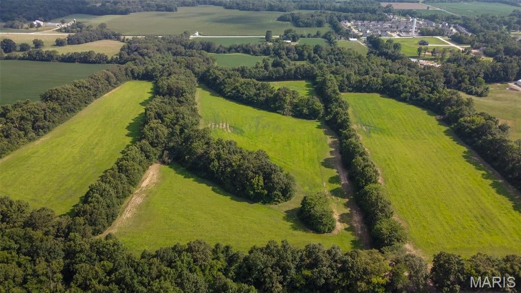 43 +/- acres located between Moscow Mills and Flint Hill. This property offers multiple potential uses, including equestrian, rural residential, agricultural, recreational, or investment opportunity.

Access to the property is through an easement running along the west side of the adjoining parcel to the north. Utilities are available at the entrance to the easement on Cuivre Point Ln, with availability and connection costs to be verified by the buyer.

Conveniently located while still offering plenty of privacy. Buyer to verify acreage, easement, zoning, permitted uses, utility availability, and any other information material to their intended use.