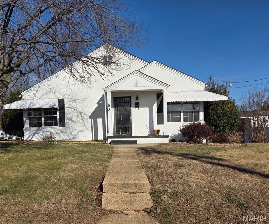 Charming 1940s traditional cottage offering approximately 1,700 square feet of living space on a desirable corner lot. This 3-bedroom, 2-bath home blends classic character with flexible living areas throughout.
The spacious primary bedroom provides comfort and privacy, while multiple non-conforming rooms offer endless possibilities for additional sleeping areas, office space, hobby rooms, or playrooms.

A large finished attic adds even more usable square footage and just needs a little TLC to truly shine. The basement includes multiple rooms for storage, workshop space, or future finishing potential, plus the convenience of a basement parking garage.
With timeless cottage charm and room to grow, this home offers versatility for families, investors, or buyers needing flexible space. The corner lot location adds curb appeal and yard space to enjoy.


Schedule your showing today and explore the possibilities!