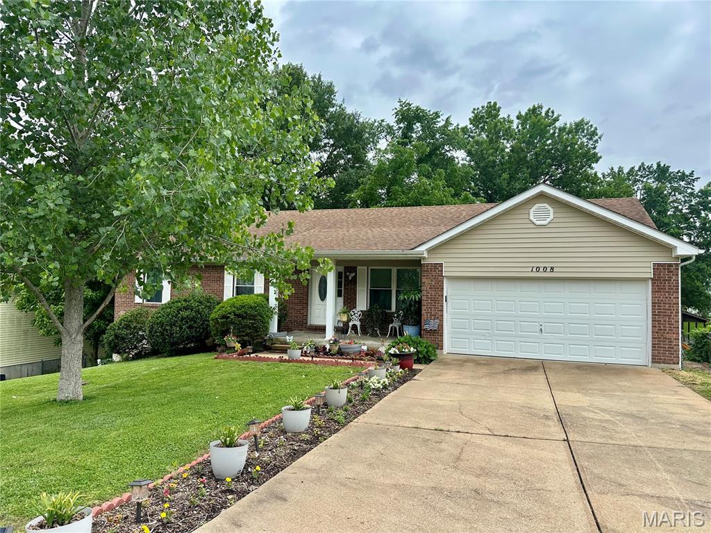 WELCOME HOME TO THIS METICULOUSLY CARED FOR HOME IN A BEAUTIFUL SUBDIVISION IN IMPERIAL. AS YOU ENTER, YOU WILL FALL IN LOVE WITH THE OPEN FLOOR PLAN, BEAUTIFUL WOOD FLOORS, AND VAULTED CEILINGS.  THE MAIN FLOOR BEDROOMS ARE SPACIOUS, THE LAYOUT OF THE DINING ROOM, FAMILY ROOM AND KITCHEN ARE PERFECT FOR ENTERTAINING AND JUST WAIT TIL YOU SEE THE FINISHED WALKOUT BASEMENT WITH A LARGE BEDROOM, JACK N JILL BATHROOM, FAMILY ROOM, LOTS OF STORAGE, AND A ONE OF A KIND BAR AREA THAT WILL MAKE YOUR HOUSE THE PLACE TO BE!!!! THIS HOME INCLUDES NEW HVAC, NEW WINDOWS, MAIN FLOOR, LAUNDRY, AND UPDATES GALORE!