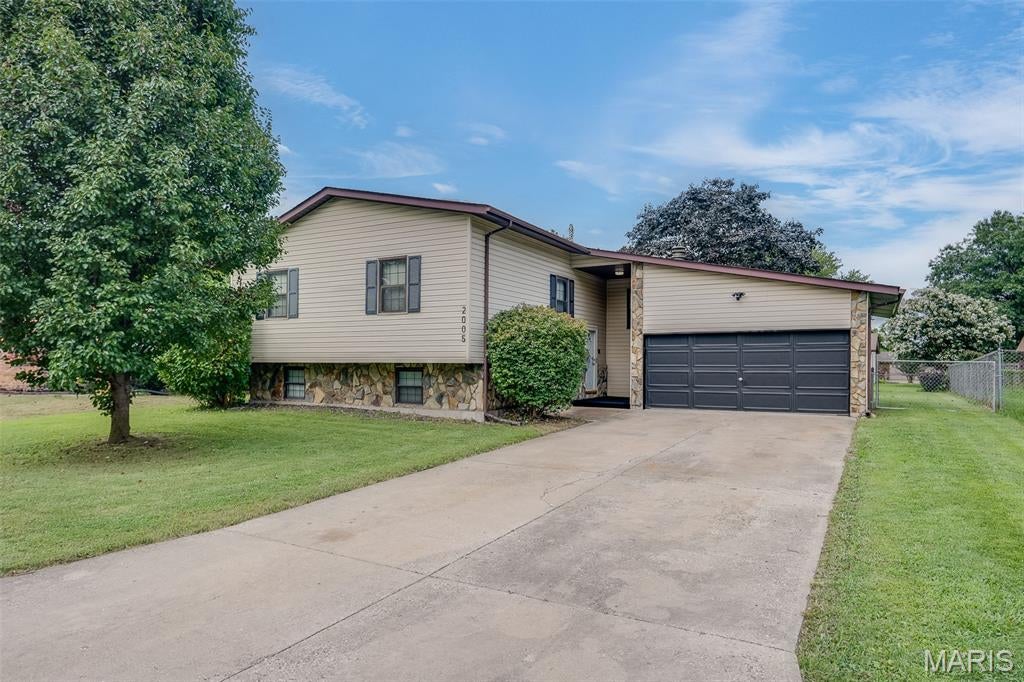Welcome home to this well-maintained 3-bedroom, 2-bath split-level offering thoughtful updates, smart-home features, and plenty of extras! The kitchen comes fully equipped with Samsung appliances, including a touchscreen refrigerator, stove, and a dishwasher that has never been used—all staying with the home as an added bonus. Full basement for extra storage or additional family room.

Major systems have also been updated, including a newer furnace, A/C unit, hot water heater, and Nest smart thermostat, giving the next owner added peace of mind. Exterior Ring cameras will remain with the property, along with a secure package delivery box bolted to the front porch.

Out back, you'll find a recently refurbished and freshly painted deck, perfect for relaxing or entertaining. A custom-built swing gate provides convenient access to the backyard, making it easy to bring in larger items or accommodate a riding lawn mower for yard maintenance.

Located in Cahokia Heights, the home is also near the community's newly opened high school, adding another exciting investment to the area. With updated systems, included appliances, smart-home features, and functional outdoor upgrades, this home has so much to offer. Schedule your showing today!

Buyer to independently verify all MLS information, including but not limited to square footage, room measurements, lot size, taxes, and school district.