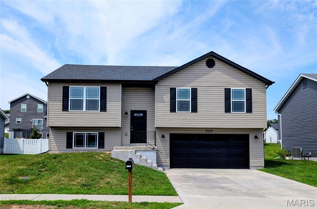Move-in ready! 3Bed/2Bath home with every option you could imagine! They include vaulted ceilings, rounded “bullnose” corners, granite or quartz countertops, stainless steel appliances, 42" cabinets with "cushion close", custom neutral-colored paint job throughout, LVT flooring throughout most of the home, framed windows, taller baseboards, adult-sized cabinets in bathrooms with marble countertops, walk-in closets, upgraded carriage garage doors with openers on 2 CAR Garage, 6- panel doors, and upgraded water/light fixtures throughout the house! Main Floor Laundry! Fully sodded yard (front/sides/back) & composite deck!