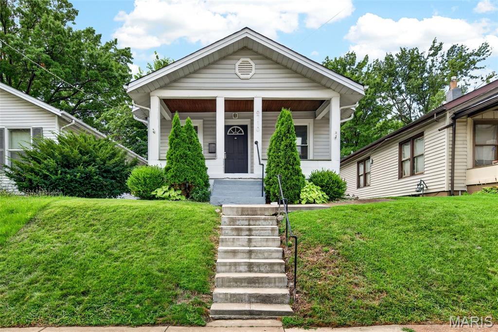 Welcome to 6710 Mitchell, a beautifully updated home located in the city! This home is situated a few doors down from Franz Park where you will find a playground and walking paths. The spacious front porch, wood flooring, granite countertops and stainless steel appliances are just some of the beautiful amenities in this house. This two bedroom, one full bath home has updated windows that let in plenty of light. The basement has great storage space, and comes with a washer and dryer. The backyard is fully fenced with a storage shed and has ample parking in the alley. This adorable bungalow close to Dogtown won't last long!