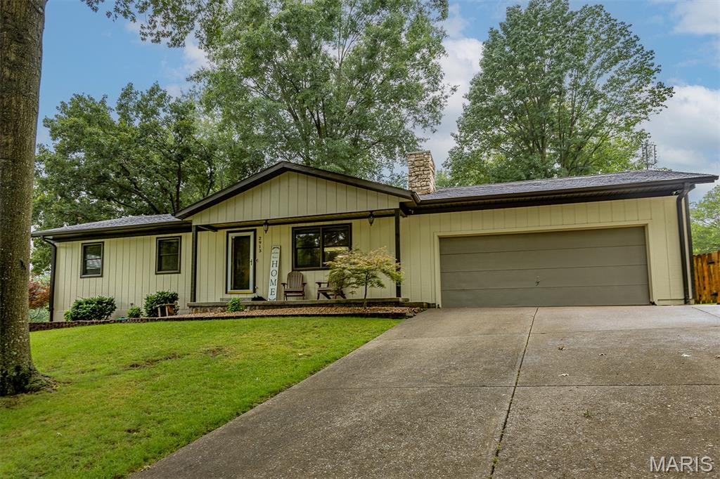 Welcome to 2913 Alta Cuesta in Cape Girardeau, Missouri—a beautifully maintained one-owner home offering the perfect blend of comfort, functionality, and space. This 3-bedroom, 3-bath home features an open-concept floor plan designed for both everyday living and entertaining.

The spacious kitchen is the heart of the home, complete with stainless steel appliances, abundant cabinetry, and a convenient eat-at bar that opens seamlessly to the dining and living areas. Gather around the cozy wood-burning fireplace in the main living space or enjoy year-round relaxation in the bright sunroom overlooking the backyard.

Outdoor living is just as impressive with a covered patio featuring its own fireplace, creating the perfect setting for entertaining guests or enjoying quiet evenings at home. The fenced backyard provides privacy and space for pets, play, or gardening.

Convenience abounds with main-level laundry and a thoughtfully designed layout. The walkout basement expands your living options with a large family room, recreation room, dedicated office area, full bathroom, and plenty of flexible space to fit your lifestyle.

With one-owner pride of ownership, multiple living and entertaining spaces, and desirable amenities throughout, this Cape Girardeau home offers exceptional value and versatility. Don't miss the opportunity to make 2913 Alta Cuesta your next home.