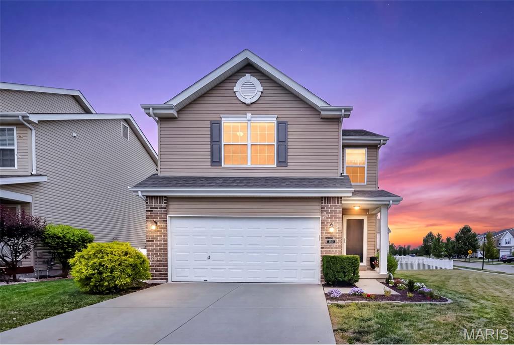 A corner lot in Charlestowne is a rare find! Step inside this beautifully updated Two-Story home in one of St. Charles' coveted golf cart communities in desirable Orchard Farm School District. The inviting family room features a gas log fireplace right off your breakfast room & kitchen area. The kitchen has newer LVP flooring, SS appliances, a large pantry and bar seating to accommodate everyone. Upstairs is the spacious primary bedroom with 2 large walk-in closets, 2 sink vanity, walk-in shower and corner bathtub. Right off the primary is the convenient second floor laundry room along with 2 bedrooms and a second full bathroom. Love to entertain on game days? The finished basement features a large rec room, modern wet bar and half bath along with plenty of storage space. The backyard is fully fenced and comes equipped with a lawn irrigation system you can control easily from your phone. This home truly has it all! Located right off hwy 370 with easy access to the shops & restaurants in New Town, around Elm Street and a quick drive to Main Street. Open house Thursday 5-7pm and Sunday 1-3pm!