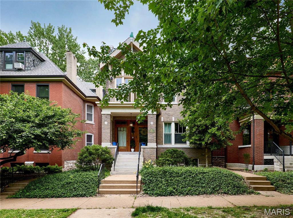 BACK ON TH MARKET AND BETTER THAN EVER!  Spanning over 3,000 sq. ft.  this home blends 1912 character with modern luxury. The main-floor features a chef'S dream kitchen with light maple cabinetry, a massive granite island with a Jenn-Aire gas cooktop, an eat-in kitchen and a formal dining room, sporting, beautiful stained glass window, French doors and a butler pantry. UPDATES INCLUDE: INTERIOR: FRESH PAINT THROUGHOUT, REFINISHED BASEMENT WALLS AND FLOORING, EXTERIOR: GARAGE ROOF AND DAMAGED FACIA BOARDS REPLACED, GARAGE TRIM AND DOORS PAINTED, REAR EXTERIOR WINDOW SILLS REPAIRED AND PAINTED AND BUSHES, TREES AND BRANCHES TRIMMED. PLEASE SEE UPDATED SELLER'S DISCLOSURE AND HOME IMPROVEMENTS LIST.

Upstairs, the primary suite is a true retreat, boasting a private balcony, a walk-in closet, and a spa-like bathroom with a soaking tub, separate shower and a custom=made double vanity. Two additional bedrooms include their own private or hallway baths. Also included is a second-floor laundry with utility sink and cabinet space, a two-car detached garage and a beautifully landscaped yard requiring minimal maintenance. Steps form Tower Grove Park - this is South City living at its finest!