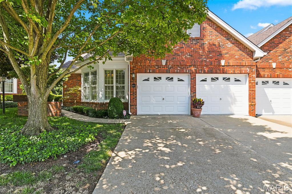 Tucked away in the gated Amberleigh community, this end-unit ranch villa has been lovingly maintained by its original owner and offers an incredible canvas for your personal touch. Spanning 3,400 square feet of total living area, this home is a standout for anyone seeking the ease and flow of true one-floor living. You’re greeted by soaring ceilings, rich wood flooring, and elegant plantation shutters adorning large windows—including several newly installed Andersen windows—that set a sophisticated, airy tone throughout. The heart of the home is a light-filled great room anchored by a gas fireplace, flowing seamlessly into the formal dining room & wet bar area. The sunlit kitchen with an abundance of 42" white cabinets features a cozy breakfast room, perfect for slow mornings with a cup of coffee. Private deck for relaxing. Retreat to the primary suite, a generous space complete with dual walk-in closets and a sizable ensuite bath.  Private laundry room and attached 2 car garage. The lower level adds even more versatility with a large second bedroom, a third bath, and a sprawling recreation room with wet bar. Step outside from the walk-out basement to a private patio, ideal for enjoying some fresh air in a peaceful setting. Mechanical updates provide lasting peace of mind, as the home features a newer water heater (1 yr) , two furnaces (upper level is 1.5 ys) , and one newer AC unit (2 ys) . Situated in a prime location just moments from a variety of shops, grocery stores, and local eateries, this residence perfectly balances convenience with modern living.