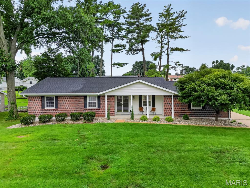 Nearly 2,300 square feet of beautifully finished living space thoughtfully renovated and completely move-in ready. Step inside to an open, inviting floor plan featuring luxury vinyl plank flooring, shiplap-accented ceilings and recessed lighting throughout. The beautifully redesigned kitchen custom cabinetry, quartz countertops, a large center island and stainless steel appliances, opening to a spacious hearth/eat-in area with fireplace and plenty of room for entertaining. The main level offers 3 bedrooms and 2 full baths, including a private primary suite with walk-in closet and beautifully updated bath with comfort-height vanity. The finished lower level adds even more living space with a large recreation room and plenty of storage. Outside, enjoy a huge, level backyard, large patio, oversized 2-car rear-entry garage and newer roof. Conveniently located in St. Charles with easy access to major highways, shopping, dining and entertainment.