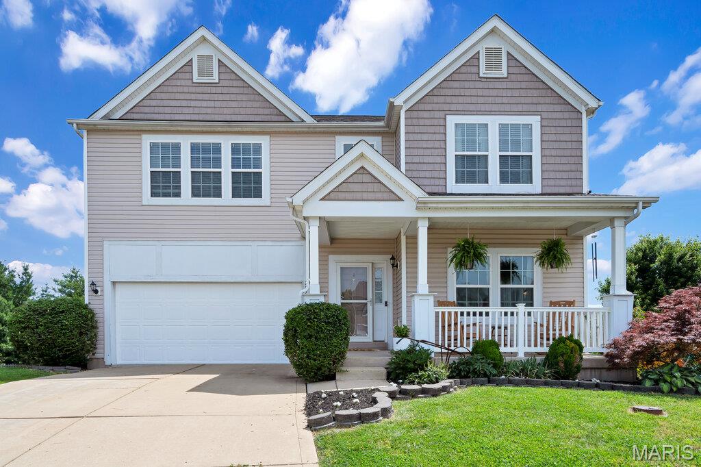 A rare find, tucked away on a quiet cul-de-sac on nearly half an acre! Situated on one of the largest lots in the neighborhood, this beautiful Lake Saint Louis 2-story home offers the perfect blend of space, privacy, scenic pond views, and everyday comfort. With a large fenced backyard, common ground behind the home, and peaceful water views with a fountain, this property offers the kind of outdoor setting that’s hard to find in a neighborhood community.

From the moment you arrive, the inviting covered front porch and classic curb appeal create a warm first impression. Inside, the open floor plan features fresh paint, brand-new carpeting on the main and upper levels, durable LVP flooring, 9-foot ceilings, and bright, spacious living areas filled with natural light and comfortable flow throughout the home.

At the heart of the home, the kitchen offers stainless steel appliances, custom cabinetry, a center island, walk-in pantry, and an open layout that flows seamlessly into the dining and family rooms. Sliding doors lead to the expansive 16x20 wood deck overlooking the pond and backyard, offering a peaceful outdoor setting to enjoy quiet mornings, beautiful sunrise views, and the perfect spot for summer dinners! 

Upstairs, you’ll find a versatile loft space, laundry room, full bath, along with four spacious bedrooms, each featuring walk-in closets.

The primary suite offers a relaxing retreat with a coffered ceiling, oversized walk-in closet, soaking tub, separate shower, and double vanity.

The finished walk-out lower level provides even more flexible living space with a recreation/media room, office area, sleeping space, full bathroom, built-in under-stair nook, and additional storage — ideal for guests, hobbies, working from home, or movie nights.

Major updates include a 1-year-old roof, new AC in 2024, and a tankless water heater — a premium upgrade that provides continuous hot water on demand.

Located in a highly desirable subdivision with walking trails, pool, clubhouse, playgrounds, sidewalks, scenic ponds, and easy access to highways, shopping, dining, and top-rated schools, this move-in-ready home offers not only convenience, but a lifestyle buyers will truly love coming home to.