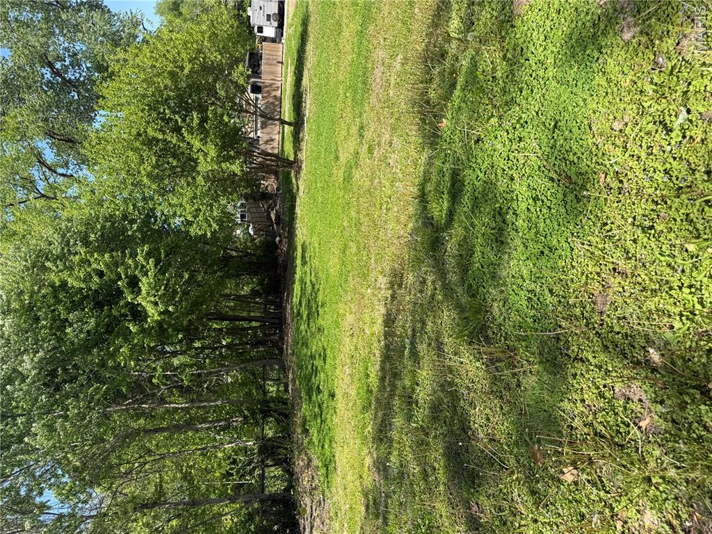 Residential lot for sale in Cottage Hills, seller has no knowledge of utilities on site. Buyer to confirm any future use with county and confirm the status of utilities for future use. Ideal lot for many purposes, adjoining lot at 1433 8th st Cottage Hills is also for sale, buy both and have over 1/3 of an acre lot. Buyer/buyer's agent to verify all zoning/utility details prior to offer.