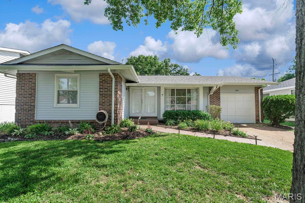 Excellent curb appeal at this nicely updated partial brick ranch in sought-after Sorrento Subdivision. 3 bedrooms, 2 bathrooms, 1-car oversized garage, and 1,943 sq ft of living space. The stamped brick sidewalk and beautiful landscaping lead to a covered front porch. Ceramic flooring at the entry foyer opens to the living room with hardwood flooring and recessed lighting. Updated kitchen features stainless appliances, a new stove, custom backsplash, recessed lighting, a pantry, and a dining area that opens to an awesome entertaining space with a patio, privacy railing, sun awning, and level fenced yard. Primary suite includes hardwood floors, a modern ceiling fan, and a full bath with a subway tile surround shower, updated vanity, ceramic flooring, and wainscoting. 2 additional bedrooms with hardwood flooring and an updated full bath with an updated vanity, ceramic flooring, and shower surround. Luxury vinyl flooring and recessed lighting in the lower level that includes a bonus room, rec rooms, and a family room with a brick mantle decorative electric fireplace. Office and laundry room with washer/dryer that stay. Roof (2022), water heater (2026), 6-panel doors, vinyl siding, enclosed soffits/fascia, vinyl windows, and highly-rated Parkway schools!