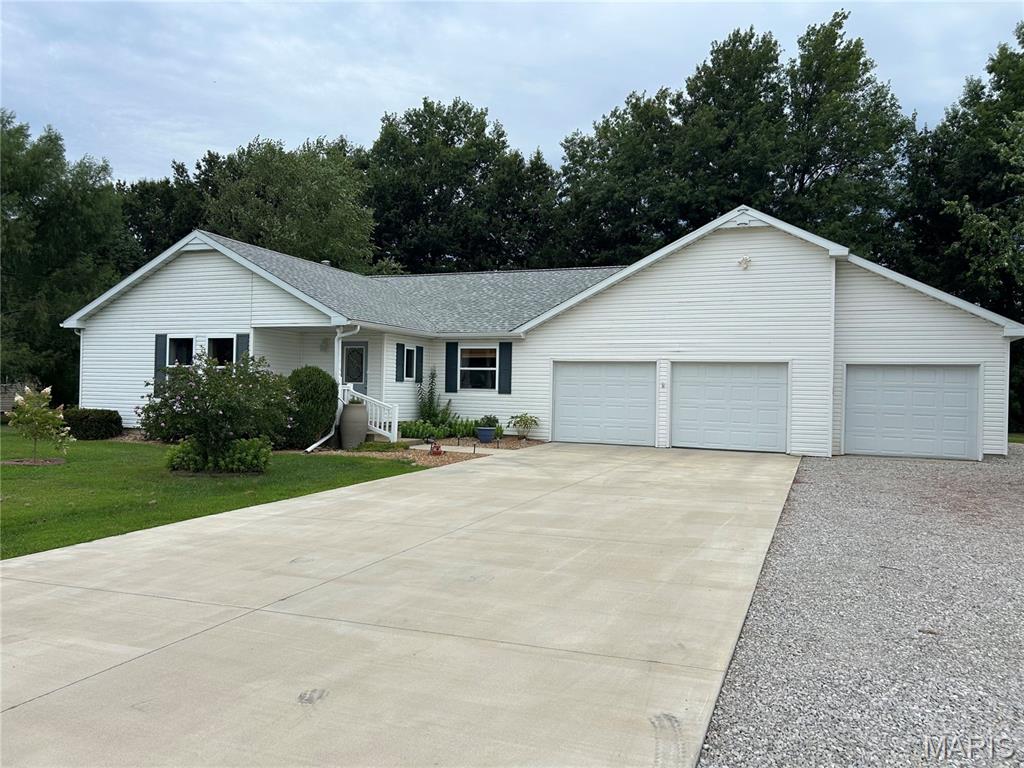 ONLY A FEW MINUTES FROM CITY LIMITS OF VANDALIA AND CLOSE TO VANDALIA LAKE IS THIS 4 BEDROOM ,3 BATH RANCH HOME. NICE LEVEL LOT WITH A SHADED BACK YARD WITH DECK AND PATIO FOR YOUR EVENING RELAXING. 3 CAR GARAGE WITH HEATED 3RD SPACE. LOTS OF UPDATES AND IMPROVEMENTS ARE PROVIDED IN AN ATTACHED INFORMATION SHEET ALONG WITH RESIDENTIAL DISCLOSURE. ALL OF THIS LOCATED IN A SMALL RESIDENTIAL SETTING AND SUBDIVISION