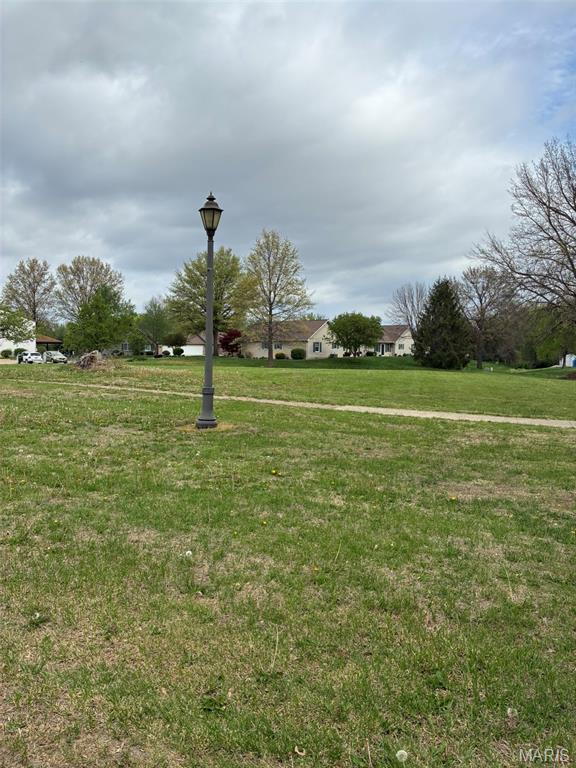 A RARE OPPOUTUNITY!  This approximately .5acre parcel is zoned multi-family in the heart of Highland.  It's in a quiet area of multi-family residences.  Slightly rolling easy to build lot.  City building code and restrictions apply.  Utilities are available at street.  A survey and parcel ID number will be provided before closing.