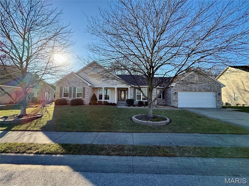 Well-cared for Ranch in ideal location with great curb-appeal! Common ground across the street with Gazebo. Fenced-in flat backyard with a few trees and patio. Open concept living right when you walk in. Formal dining room with coffered ceiling. Living room and kitchen has vaulted ceilings making the open space feel very large. White cabinets with center island and skylight. Split bedroom layout with main bedroom on one side of the house and other 3 bedrooms on the other side. Main bedroom has walk in closet. Main bathroom has soaker tub, dual vanities and walk-in shower. Other 3 bedrooms are nicely sized with full bathroom off of hallway with additional skylight. New roof and siding. Don't miss out on this hard-to-find Gem in an ideal OFallon neighborhood. Schedule a showing today!