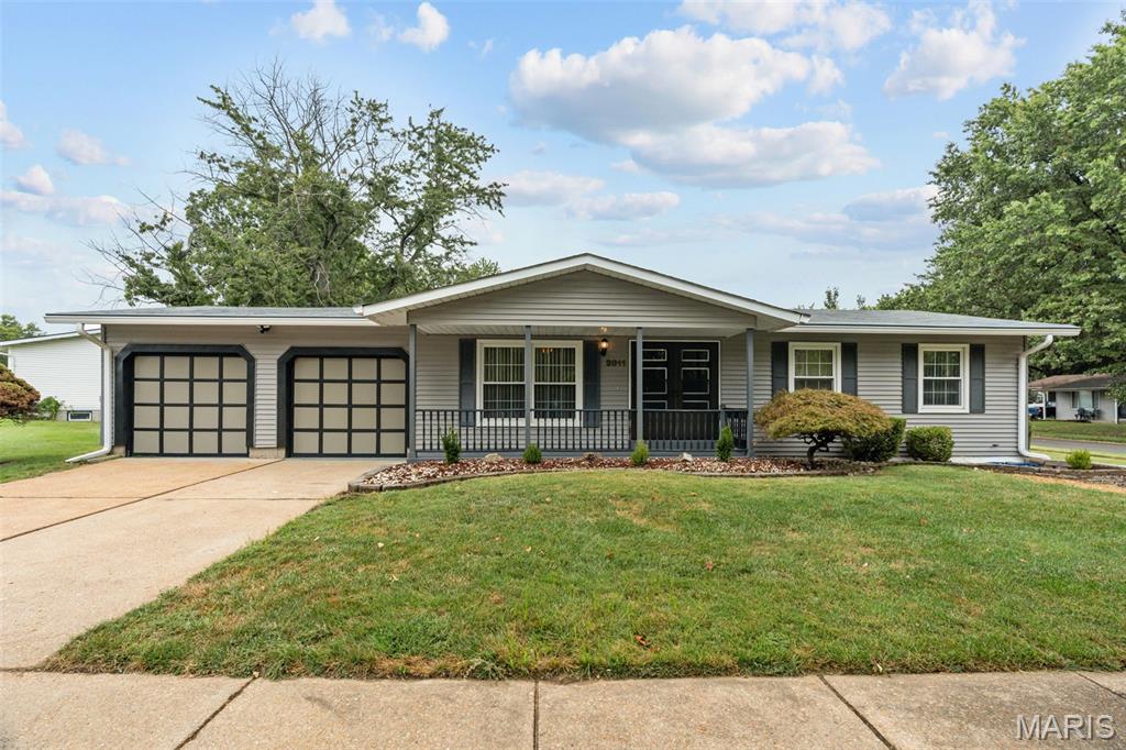 This is it! Welcome to 2011 Marrisa!! This beautifully refreshed 3-bedroom, 2-full-bath home combines classic charm and modern finishes with just under 2000 sq ft of living space on a large corner lot with a fully fenced private backyard! Step inside to find refinished original hardwood floors and fresh paint throughout the main level. The updated kitchen shines with brand-new quartz countertops and stainless steel appliances, while both bathrooms have been thoughtfully renovated with fresh tile, new vanities, and stylish fixtures. The spacious primary bedroom features a private en-suite bathroom, creating a comfortable retreat.

The finished lower level adds valuable living space with fresh paint and new carpet—perfect for a family room, rec room, home office, or gym. A spacious 2-car garage provides plenty of parking and storage.

From the beautifully updated interior to the oversized corner lot and private backyard, this home checks all the boxes. Turnkey, stylish, and ready for its next owner—don’t miss this one!