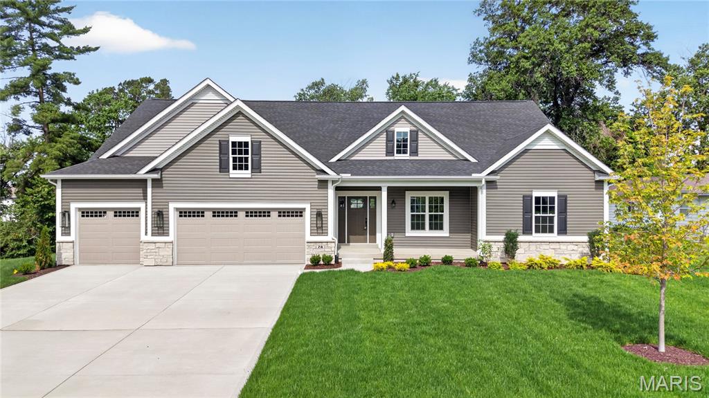 This stunning McKelvey Custom home showcases our sought-after LaSalle Floorplan, designed with both elegance and functionality in mind. The heart of the home is a large, expanded gourmet kitchen complete with an elegant butler’s pantry. A built-in microwave and oven combo, gas cooktop, and stainless steel vent hood create a chef’s dream space, while thoughtful design ensures every detail is as beautiful as it is practical. The great room boasts soaring 11-foot ceilings and a wall of large windows that flood the space with natural light, opening to a 20' x 13' covered back porch—perfect for relaxing or entertaining. A stone-surround gas fireplace, flanked by custom wood bookshelves, adds warmth and grandeur to the room. Elegant oak handrails with wrought iron spindles complete the staircase, adding a refined architectural touch. The owner’s suite is a true retreat, embodying the designer style McKelvey Homes is known for. The luxury owner’s bath features an oversized shower you’ll never want to leave. With custom options and opulent upgrades throughout, this one-of-a-kind home offers the perfect blend of comfort, sophistication, and craftsmanship. Don’t miss your opportunity to make 74 Weis Avenue your dream home.