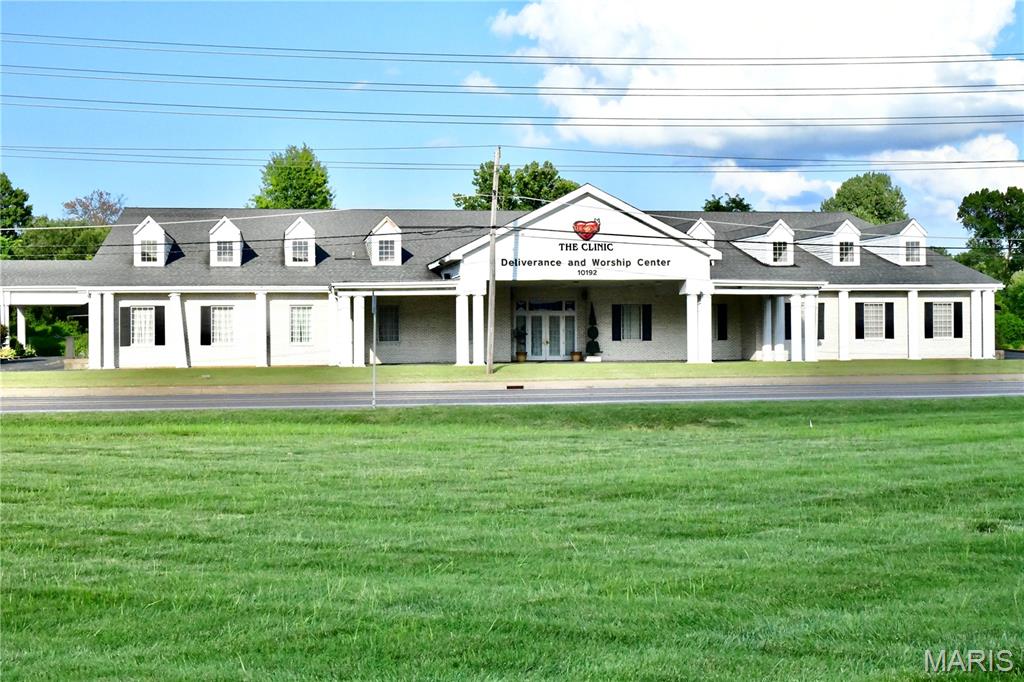 For Sale and Banquet Hall and Rooms for Rent. This 13,751 sq. ft. commercial church building, originally built in 1997 as a funeral home and thoughtfully converted into a church, offers a perfect blend of functionality and style. Situated on a landscaped lot with concrete walkways, driveway aprons, grassy areas, planter sections, and a semi-circular driveway with ground-controlled lighting and an identification sign, the property includes an asphalt parking lot for up to 100 vehicles, two concrete floodway retention basins, and a creek along the rear boundary separating the main parcel from additional land. The building features a vinyl siding exterior with a brick veneer front, three attached canopies, two entrances, and climate control via a roof-mounted furnace and central air. Interior spaces include a 150-seat sanctuary with a brass and marble chandelier, black tiled flooring, and recessed and sconce lighting, a welcome center, kid center, bookstore, fellowship hall, two additional halls, main hallway, kitchen, executive office with half bath and shower, women’s lounge, and men’s bathroom. With 600-amp and 200-amp electrical service, this versatile property is ideal for religious organizations, community centers, event venues, or other commercial uses, combining excellent accessibility, extensive amenities, and a prime location on Four/Six Land Halls Ferry Road.