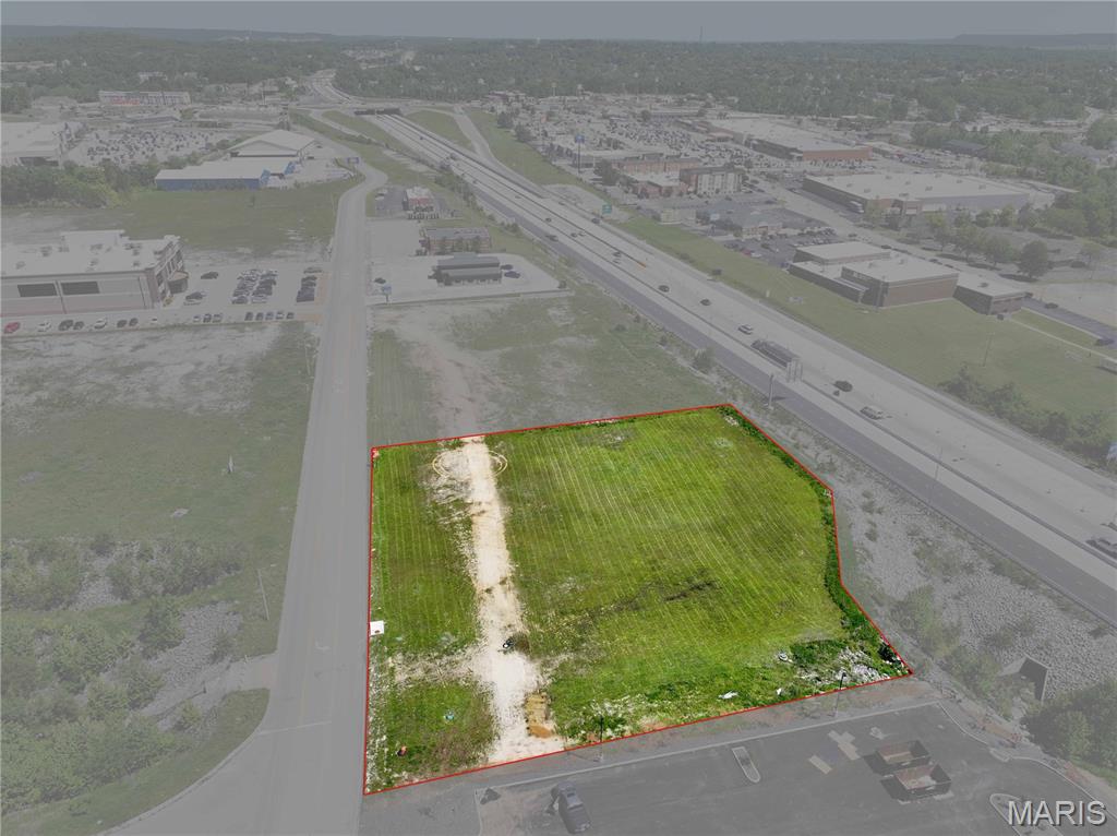 Position your business in one of the fastest-growing commercial corridors in Festus with this exceptional 1.59 +/- acre lot located in the highly sought-after Festus Commerce & Business Center.

This premier site offers over 275 feet of highly visible I-55 frontage, providing outstanding exposure and easy accessibility in a high-traffic area. With only a limited number of interstate-visible lots remaining, this is a rare opportunity to secure a premium location in a thriving business district.

Surrounded by established national franchises including Planet Fitness, Texas Roadhouse, and KFC, this development continues to attract strong commercial growth and customer traffic.

Property features include:

1.59 +/- acres
Excellent I-55 visibility and frontage
High-traffic commercial location
Located within a rapidly expanding business and retail center
Divisible lot options available
Ideal for retail, restaurant, hospitality, office, or service-based businesses

Whether you’re an investor, developer, or business owner looking for a strategic location with exceptional exposure, this property offers outstanding potential in one of Festus’ premier commercial developments.