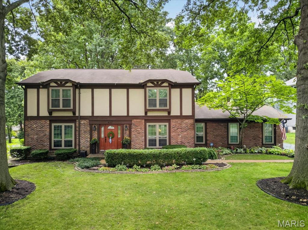 Come Home to a Community You’ll Love

Welcome to a beautifully cared-for home in Whispering Oakwood, where inviting spaces, thoughtful updates and an active neighborhood lifestyle come together.

From the moment you arrive, meticulous landscaping and standout curb appeal set the tone. Out back, your private oasis is ready for everything from quiet summer evenings to cozy fall nights around the fire. The covered back porch makes an ideal spot for morning coffee, weekend brunch or gathering with friends after a busy day.

Inside, hardwood floors span the main level, complemented by charming board-and-batten accents that add warmth and character. A spacious main-floor laundry room creates an easy transition from the garage into the family room—perfect for keeping everyday life organized.

Upstairs, the generous primary suite offers a comfortable retreat with two large walk-in closets. Three additional bedrooms provide plenty of room for guests, hobbies, a home office or whatever your lifestyle calls for. Updated and refreshed bathrooms add another layer of move-in-ready appeal.

But the real magic happens outside your front door. Whispering Oakwood is more than a neighborhood—it’s a community. Get involved, meet your neighbors and make memories at traditions like the annual WO 500 soapbox derby, chili cook-offs, book clubs and more. Whether you’re looking for connection, activity or simply a place where people know your name, this is a neighborhood designed for living well.

Recent improvements include new windows (2018), HVAC systems (2020) and a new water heater (2025), giving you peace of mind while you enjoy all this home and community have to offer.

Beautifully maintained. Thoughtfully updated. Connected to a community you’ll be proud to call home.