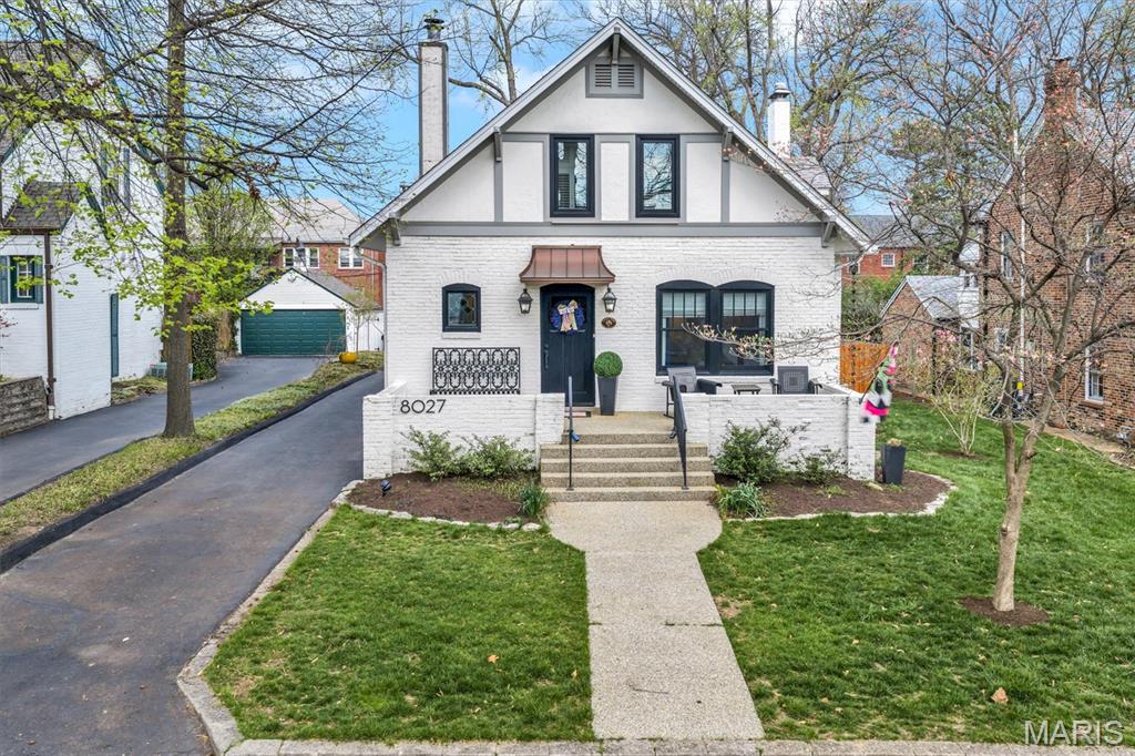 Welcome to 8027 Teasdale Avenue! This “Century Home” on a quiet, tree-lined street in University City is a complete show stopper! Timeless charm and character have been impressively blended with modern taste and upgrades. As you enter beneath the copper awning, gleaming hardwood floors throughout the main level are sure to catch your eye. The front of the home boasts the living room and a private office, complete with a half-bath. You’ll walk through the separate dining room to get to the heart of the home - the thoughtfully designed kitchen! A large farmhouse sink sits at the center of the layout flanked by stainless steel appliances, including a Cafe double drawer dishwasher! Moving to the back of the home you’ll find a 3 seasons room perfect for looking out over your lush backyard. The primary bedroom is located on the main level and includes a large ensuite bathroom. Two additional bedrooms and a full bathroom round out the upstairs living space. This home’s true hidden gem is the full, newly finished basement! The renovation includes a wet bar, family room, AND an additional bedroom with a full, ensuite bath. Outdoor entertaining is a breeze with the large deck and patio area in the backyard! Close to all the shopping and dining downtown Clayton has to offer, plus easy access to 170 for a quick commute. This one won’t last long! Showings begin on April 10 at  9 am.