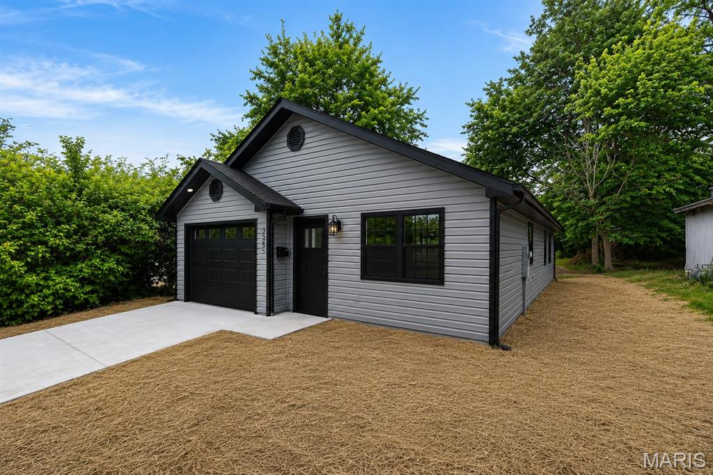 Charming New Construction | Efficient Open-Concept Living Discover the perfect blend of comfort and functionality in this thoughtfully designed home offering approximately 1,066 square feet of living space plus a 252-square-foot garage. The open-concept kitchen and living area create an inviting atmosphere that's ideal for entertaining or everyday living, featuring a spacious layout with plenty of natural light. This home includes 3 generously sized bedrooms with ample closet space and a well-appointed full bathroom. The centrally located laundry area adds convenience, while the attached garage provides secure parking and additional storage. Whether you're a first-time homebuyer, looking to downsize, or seeking a low-maintenance investment property, this home offers quality design, efficient use of space, and modern living in an affordable package. Features include: Approximately 1,066 sq. ft. of living space 3 bedrooms, 2 full bathrooms Open-concept kitchen, dining, and living area Attached 252 sq. ft. garage Dedicated laundry area Functional floor plan with abundant storage Ideal for first-time buyers, retirees, or investors Located in a quiet neighborhood close to schools, shopping, and parks, this home will be move-in ready September 2026. Builder is a licensed MO agent.
