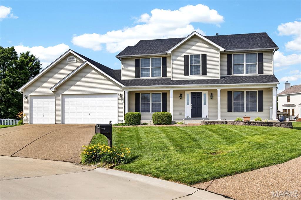 Welcome home to this beautiful family-friendly two-story in the heart of Dardenne Prairie! With 4 large bedrooms, 3 full baths, and an oversized 3-car garage featuring deep bays and 8-foot doors, there’s room for everyone—and all the toys that come with family life.

The main floor is designed for gathering, featuring engineered hardwood floors installed in 2021 and a stunning kitchen remodeled in 2024 with granite countertops, making meal prep, homework time, and holiday baking a joy. The gas fireplace with blower creates a warm and inviting space for family movie nights and has been powerful enough to help heat the upstairs during Missouri’s chilly winters. New roof November 2024. Zoned HVAC (3 years old)

Upstairs, you’ll find brand-new carpet installed in June 2026, oversized bedrooms that give everyone their own space, and a versatile loft area perfect for a playroom, homework station, reading nook, or home office.

The mostly finished lower level offers endless possibilities with a full bath, playroom, and plenty of storage. Whether you homeschool, host family gatherings, need a teen hangout space, or simply want room to spread out, this level delivers.

Step outside to a beautifully landscaped yard on a larger lot where kids can play, pets can roam, and family and friends can gather for barbecues, birthday parties, and summer evenings under the stars.

This is more than a house—it’s a place where memories are made, traditions are celebrated, and families can truly feel at home.