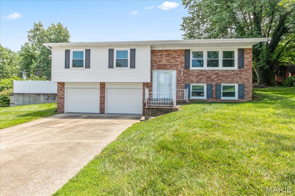 Great opportunity in St. Charles.  This 3 bedroom 2 and 1/2 bath split level is located in a cul de sac in well thought of Elmwood Manor.  If you like cabinets and storage in general then this home may interest you.  All three bedroom and the 2 full bathrooms are located on the upper level.  The lower level is partially finished with a wood burning fireplace.  The exterior offers a back patio that has afternoon shade as well as a partially (3 sided) privacy fence.  The garage is oversized at 25x20.  The location offers great access to highways, parks, schools, and the library.