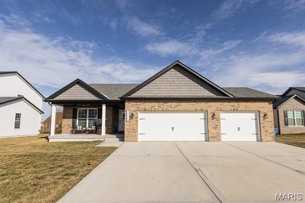 Five Bedroom Ranch Style Home in Indian Springs Subdivision Features Open 'Fairway Two' Split Bedroom Floor Plan with Vaulted Ceilings and Engineered Wood Flooring in Main Living Areas, 29 x 16 Family Room Includes Electric Burning Fireplace, 12 x 10 Dining Room, 16 x 15 Living Room, 13 x 10 Eat In Kitchen Features Premium Cabinetry, Granite Counter Tops and Stainless Steel Appliances, Gas Range, Built In Microwave, Dishwasher, Garbage Disposal and Refrigerator, Breakfast Peninsula and Storage Pantry, Adjacent Dining Area with Covered Back Patio Access, Main Floor Half Bathroom, 17 x 15 Master Bedroom with Walk In Closet, 10 x 9 Private Master Bathroom with Double Vanity Sinks and Soaking Tub with Separate Shower, Two 11 x 11 Bedrooms and 10 x 8 Main Floor Laundry Room, Full Finished Basement Provides 29 x 16 Family Room, 16 x 15 Fourth Bedroom, 14 x 13 Fifth Bedroom and 8 x 5 Third Bathroom, Fenced Back Yard, Three Car Attached Garage, Available 06/01/2026.