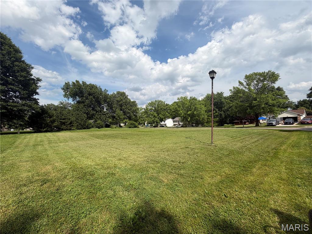 Level double buildable lot in Holiday Shores. Join the desireable lake community by building your new home, or gain lake access by being a property owner!