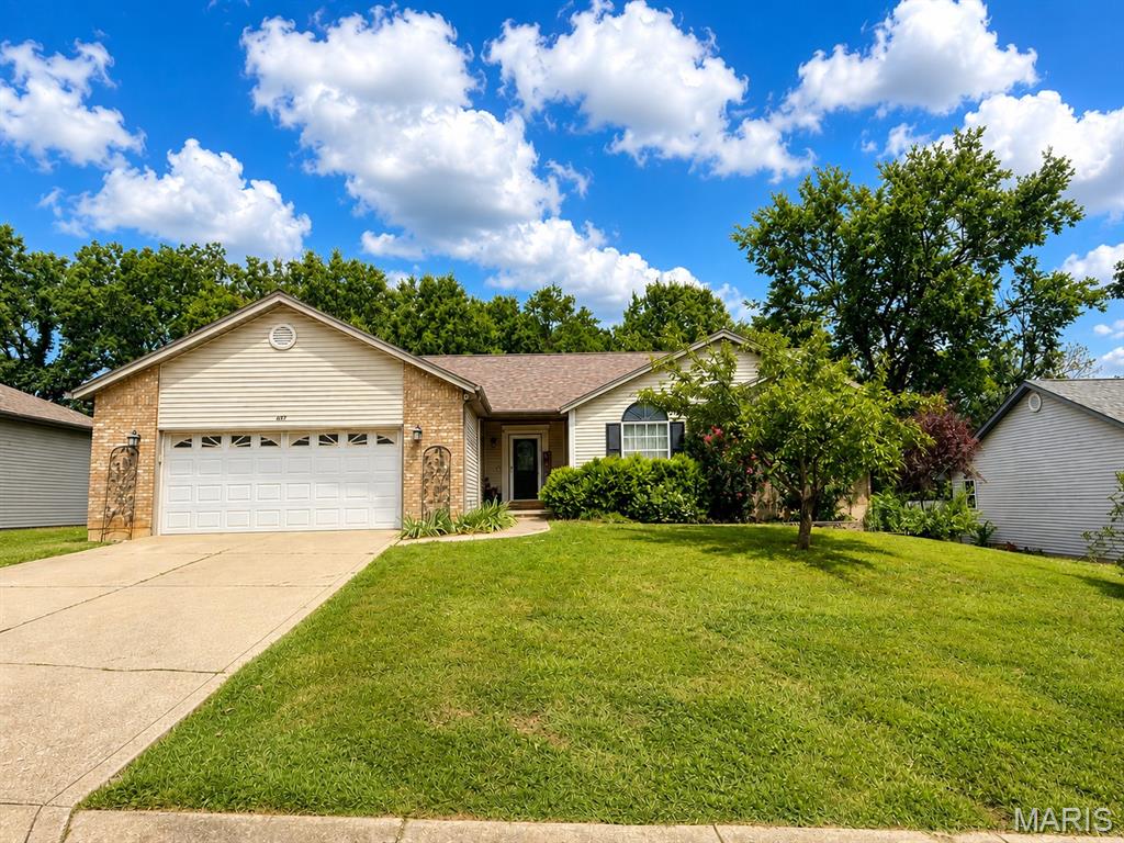 Welcome home to this spacious 4-bedroom, 3-bath walkout ranch located in the desirable and secluded Oak Akers subdivision, offering approximately 3,000 sq ft of finished living space! The inviting great room features a vaulted ceiling, creating an open and airy feel. The spacious kitchen offers custom cabinetry, a walk-in pantry, and plenty of room for gathering, while the adjoining dining area is highlighted by a charming bay window. Convenient main-floor laundry is located just off the attached 2-car garage.
The primary bedroom also features a vaulted ceiling along with a private ensuite bath, creating a comfortable retreat.
The finished walkout lower level adds tremendous versatility with a kitchenette and bar area, rec room, full bath, fourth bedroom, and a large flex space with fresh epoxy flooring perfect for a home office, game room, media room, workout space, or whatever best fits your lifestyle. Step outside to enjoy the privacy-fenced backyard backing to woods, giving you a peaceful and private setting. A deck and above-ground pool make the backyard ideal for relaxing, entertaining, and enjoying warm summer days.
With generous living space on both levels, a private wooded backdrop, and a versatile finished lower level, this home offers the space and flexibility you’ve been looking for!