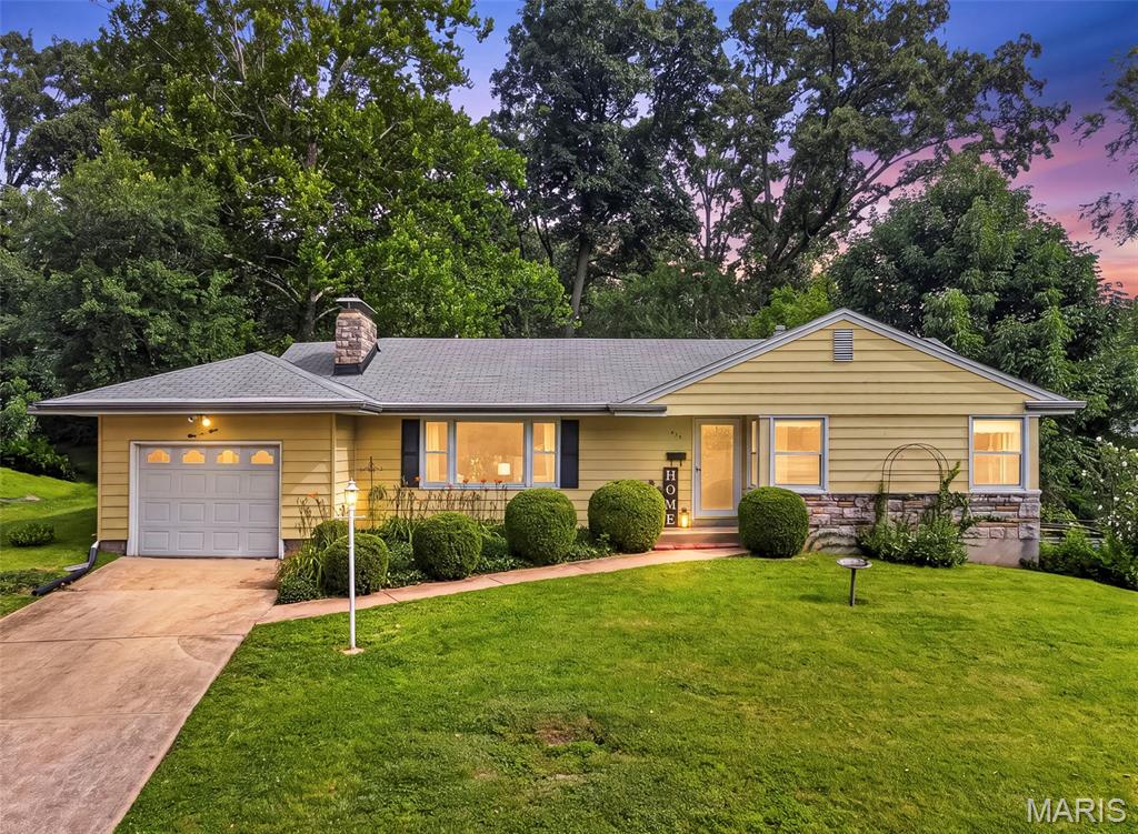 Welcome Home! This warm and inviting 3-bed, 2-bath ranch is tucked into one of Webster Groves’ tree-lined neighborhoods. Wonderful flow of spaces to create  designated  separate spaces yet entertain large groups.  a pocket door can close off kitchen, built-ins in entryway and extra dining area off of the Family Room that has been great for entertaining large groups adds another room.  Both dining spaces open to the yard.  Oh the yard!  With a gorgeous, private-feeling yard full of trees and lush greenery...you will fall in love with the yard! The home has natural light throughout with large windows in the family room and living room. This home offers the kind of comfort and charm that makes Webster so special.  With designated spaces, you’ll find a bright living room with a wood-burning fireplace, built-in shelving, a dedicated dining space (with additional dining space off family room), and the large additional family room overlooking the backyard. The family room is full of storage closets and tucked quietly at the back of the home creating a perfect retreat for relaxing, reading, or enjoying the view.  The main floor is all carpeted and has been for many years (wood floors are underneath most areas reports sellers!), offering an exciting opportunity to enjoy the carpet or reveal and restore original wood floor character. The home is being sold as-is and provides a great canvas for personalizing your indoor and outdoor living space. This home has been loved, lived in, and is ready for its next chapter! Whether that means simple updates, a full refresh, or embracing its classic charm as-is.  Seller is selling home as-is.