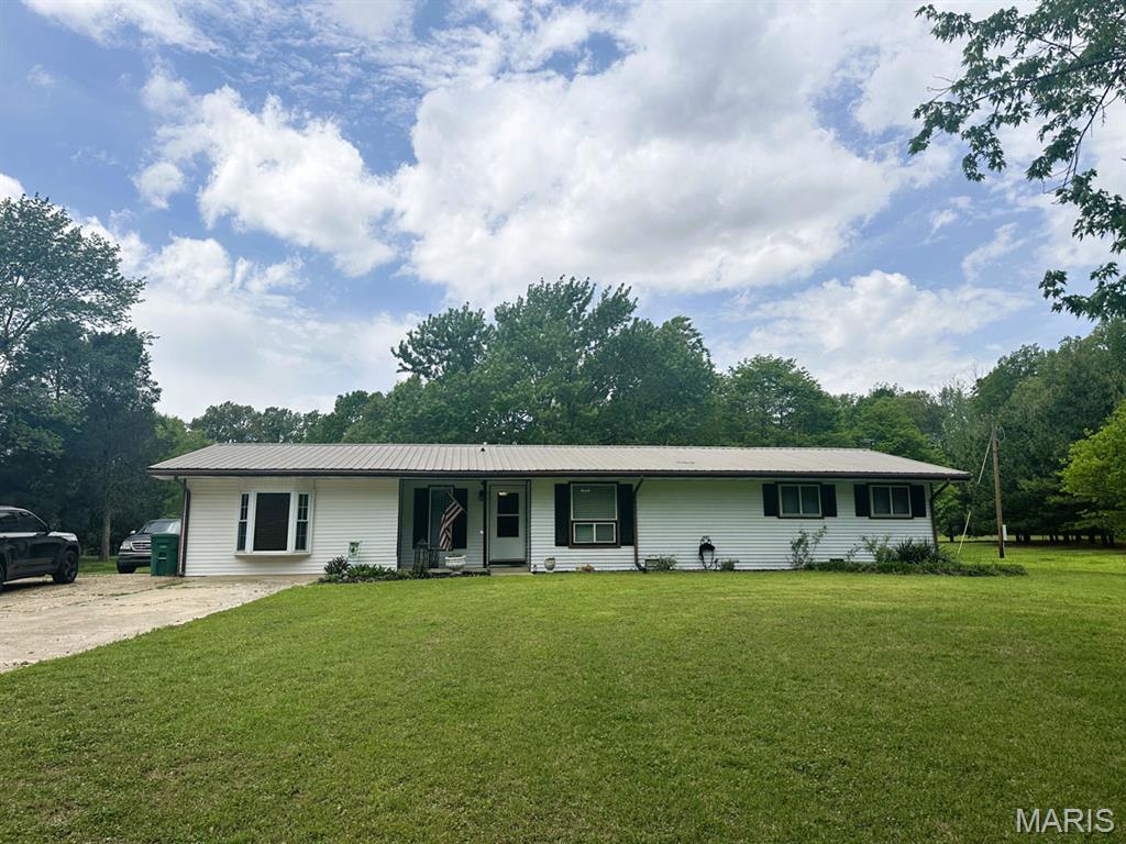 Located at the foot of Crowley’s Ridge, this 4 bedroom, 2 bath home offers 1,882 sq ft of living space on 3 acres. Inside, you’ll find newer updates throughout, along with a den featuring a bay window and coffered-style ceiling. The primary bedroom includes a large closet, providing plenty of storage. A new central heat and air unit will be installed, adding peace of mind for the next owner. The property also includes a barn, offering space for storage, hobbies, or animals while enjoying the quiet country setting.