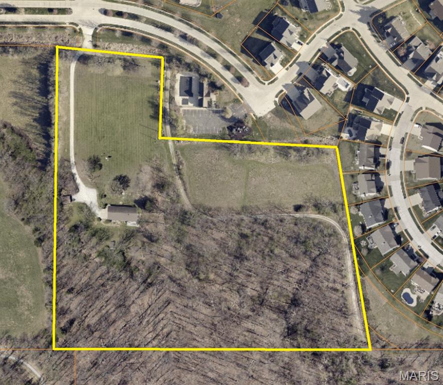 10.79 Acres of land in a prime Wentzville location off Hwy Z close to several schools! Water and sewer available via the City of Wentzville, with future zoning for medium-density residential.  City of Wentzville will require a small portion to be used as Carlton Glen Parkway extension through the Northeast section, which will give great access to the property. Currently part in pasture and part wooded with water retention spot on the south East corner. It’s a great property for a smaller builder or a family who wants to build a couple custom homes on acreage. There is a 1500 sq ft home that we do not have access to at this time (tenant).