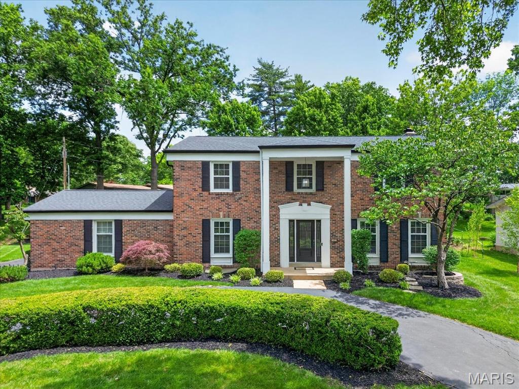 Located in the highly sought-after Runnymede subdivision, this beautifully updated two-story home is a must-see! The main level offers a terrific floor plan with seamless flow throughout, featuring a welcoming living room that opens to the cozy family room complete with a gas fireplace and direct access to the patio. A light-filled dining room, convenient full bath, and spacious eat-in kitchen with access to the attached two-car garage complete the main floor.  Upstairs, the generously sized primary suite features a spa-like bathroom and an expansive walk-in closet with a full-size laundry area. Three additional bedrooms and a hall bathroom provide ample space for family and guests.  The finished lower level offers endless possibilities for additional living and entertaining space, complete with a wet bar, dining area, full bathroom, and abundant storage. Situated on nearly half an acre, this home combines comfort, functionality, and space in an ideal location!