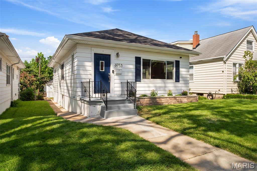 After 5 years of memories and love, this charming South City bungalow is ready for its new owner! Renovated in 2021, you'll find many updates throughout the home including a lovely kitchen with white shaker cabinets, granite counters, gas range and stainless steel appliances. The conveniently located home has beautifully refinished hardwood floors, two spacious bedrooms, as well as a delightful living room/dining room with large picture window in front, and a sun porch off of the back side of the kitchen overlooking the fenced-in yard. Downstairs you'll find an unfinished basement ready to be finished, or simply use for storage, a workout area, recreation space, etc. Out back you'll be greeted by a paver stone patio and flat, fenced-in back yard, as well as a one car garage with alley access. If you are looking for a convenient spot to walk about South City or get to anywhere with a quick drive, you've found it! New roof in 2023 for buyer peace of mind!
