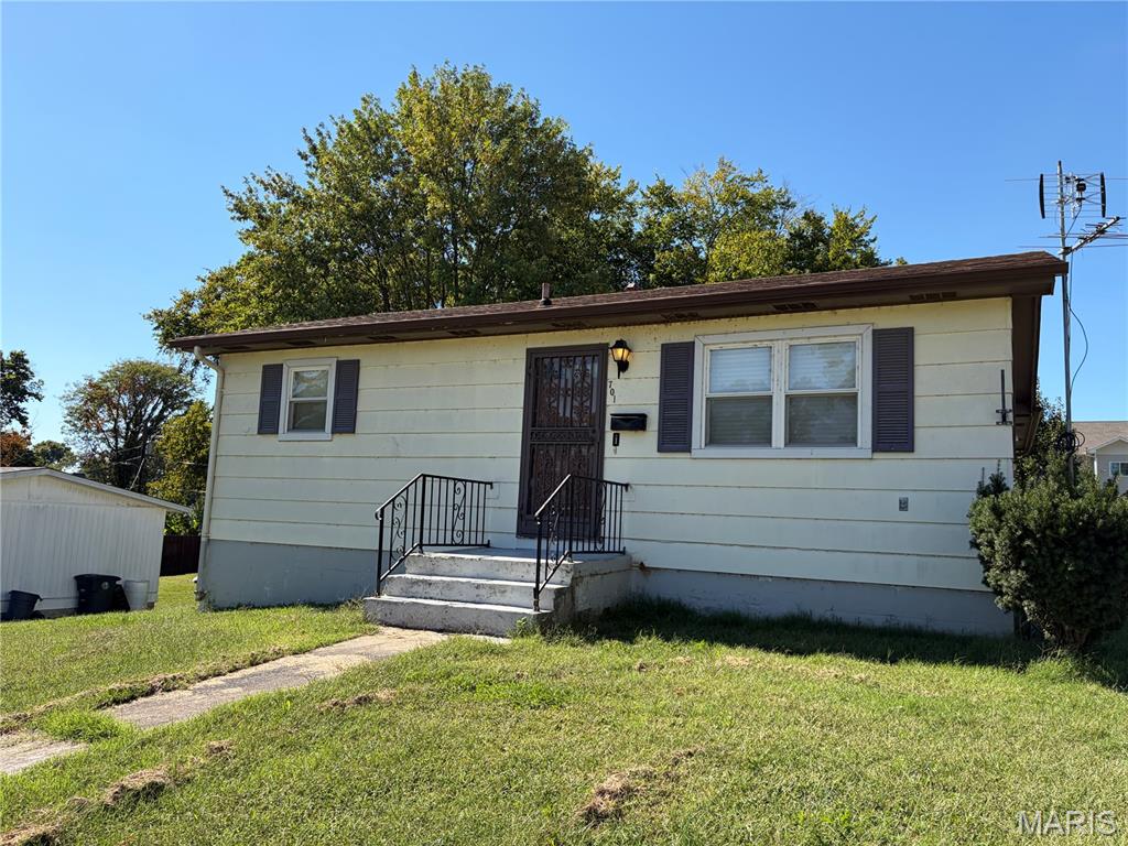 Charming 2-bedroom, 1-bath home on a spacious corner lot! This property features beautiful hardwood floors, a full basement for extra storage or expansion, and plenty of natural light throughout. With a price of just $100,000, this home offers an incredible opportunity for first-time buyers or investors.
