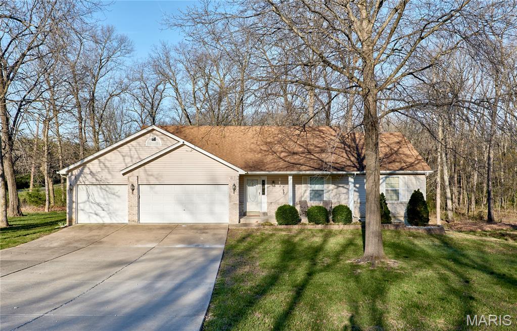 Tucked away on a serene 3.25 acre slice of paradise in the charming Winding Woods subdivision, this 1999 built gem is ready to spin its magic. With 1,532 square feet of cozy, single story living space and 2 full baths, it’s the perfect blend of comfort and country charm. Wright City offers small-town vibes with easy access to highways for St. Louis adventures, top-rated schools, and that unbeatable Missouri countryside lifestyle. Come experience the perfect balance of rural tranquility and modern convenience.
