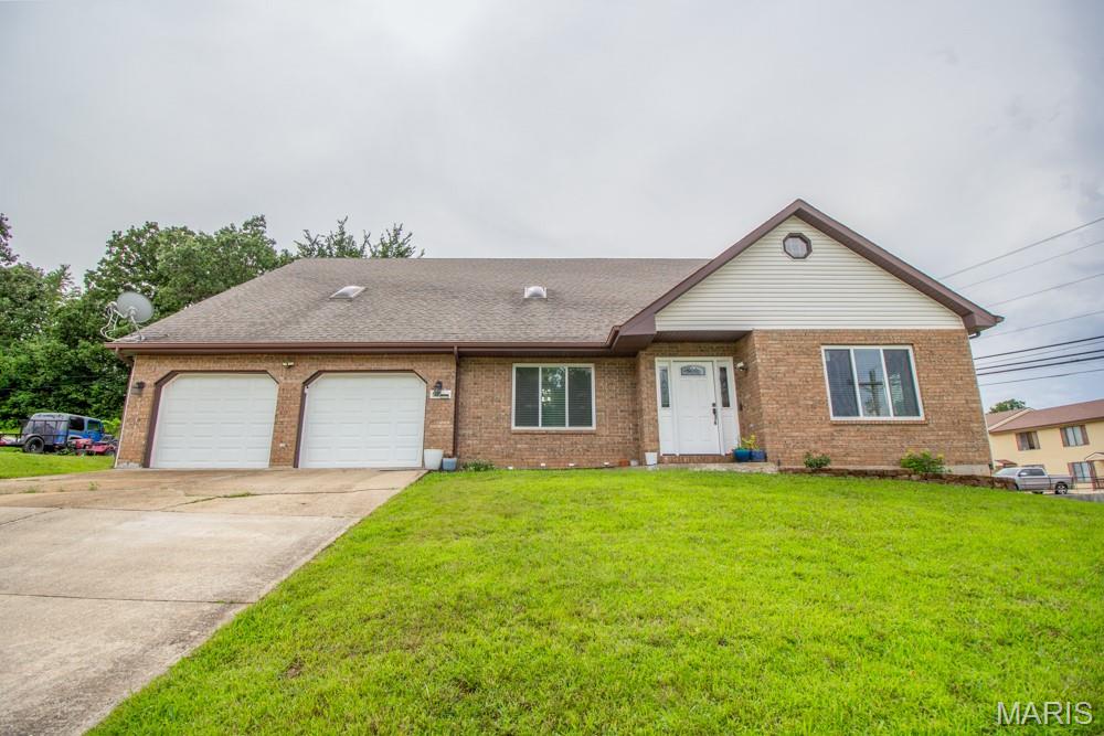 Extremely spacious home located just few minutes from Main Gate of Ft. Leonard Wood.  Newer Beautiful hardwood floors in entry, living room, stairs and dining room. Large bedrooms with two some have three closets in them! Kitchen stainless steel appliances. Large 5x8 walk-in pantry as well. Windows and front door newer with warranty from Lowes. Enjoy a lot of family time in family room located in basement.  Great home needing a family.