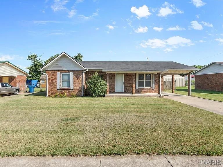 Completely Remodeled & Truly Move-In Ready!

Welcome to this beautifully remodeled 3-bedroom, 1.5-bath brick home offering approximately 1,139± square feet of stylish, low-maintenance living. Located in an established neighborhood in New Madrid, this home has been thoughtfully updated from top to bottom and is ready for its new owners.

Step inside to discover an inviting open-concept living space featuring fresh finishes, updated flooring, modern lighting, and a bright, welcoming atmosphere throughout. The completely remodeled kitchen offers updated cabinetry, countertops, and appliances, creating a space that's both functional and perfect for entertaining. Both the full bathroom and convenient half bath have been tastefully updated with modern fixtures and finishes.

Outside, you'll appreciate the timeless all-brick exterior, covered front porch, attached carport, and spacious, fully fenced backyard—ideal for entertaining, children, pets, gardening, or simply enjoying your own private outdoor retreat.

Additional features include:

• 3 Bedrooms
• 1.5 Bathrooms
• Approximately 1,139± Square Feet
• Completely Remodeled Interior
• Updated Kitchen with Modern Cabinetry, Countertops & Appliances
• Updated Full & Half Bathrooms
• Updated Flooring Throughout
• Fresh Interior Paint
• Updated Lighting & Fixtures
• Attached Carport
• Covered Front Porch
• Fully Fenced Backyard
• Low-Maintenance Brick Exterior

Whether you're searching for your first home, looking to downsize, or seeking a turnkey investment property, this beautifully updated home offers exceptional value and is ready for immediate occupancy.

Schedule your private showing today and see everything this home has to offer!