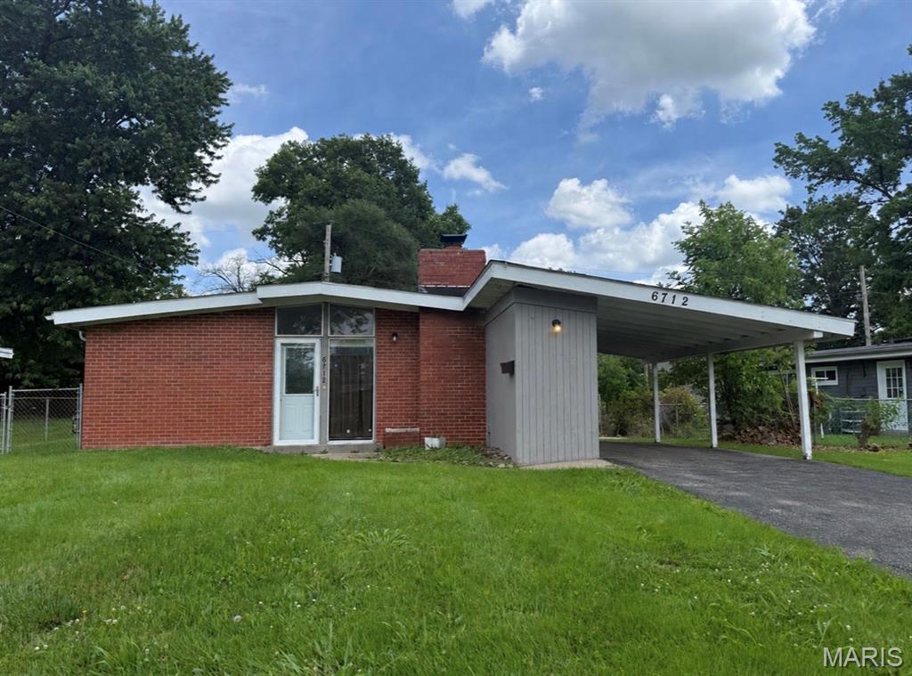 Looking for a turnkey addition to your rental portfolio or an affordable home that’s ready for its next owner? This updated 3-bedroom, 2-bath ranch offers a fantastic opportunity for both investors and first-time buyers alike. Step inside to an open-concept layout featuring luxury vinyl plank flooring, fresh paint, updated lighting, and a striking brick accent wall with a fireplace that adds warmth and character. The renovated kitchen is equipped with custom cabinetry, granite countertops, and stainless-steel appliances, creating a modern space that’s both functional and attractive to future tenants or homeowners. All three bedrooms feature newer carpeting, and the home’s thoughtful updates make it truly move-in ready from day one. With approximately 1,288 square feet of living space, this property offers comfortable living without the maintenance headaches. Conveniently located near major highways, shopping, dining, employment centers, and Lambert International Airport, the property offers easy access throughout the St. Louis metro area. Nearby rental properties in the area demonstrate continued demand for affordable housing, making this an attractive option for investors seeking cash-flow potential. Whether you’re looking to expand your investment portfolio or purchase a home that’s been updated and ready to enjoy, this one is worth a look!