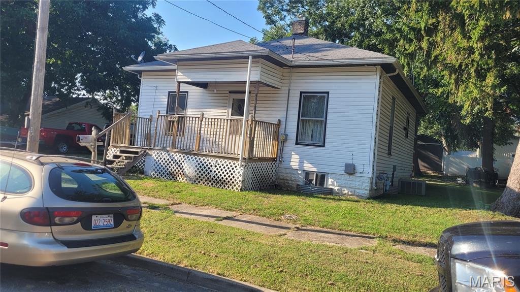 This 2 bedroom one bath home needs a little TLC, but has a lot of potential. Has a partial basement for additional storage. Nice large lot for any additions that you may want to add.  Call your favorite realtor and view today.
