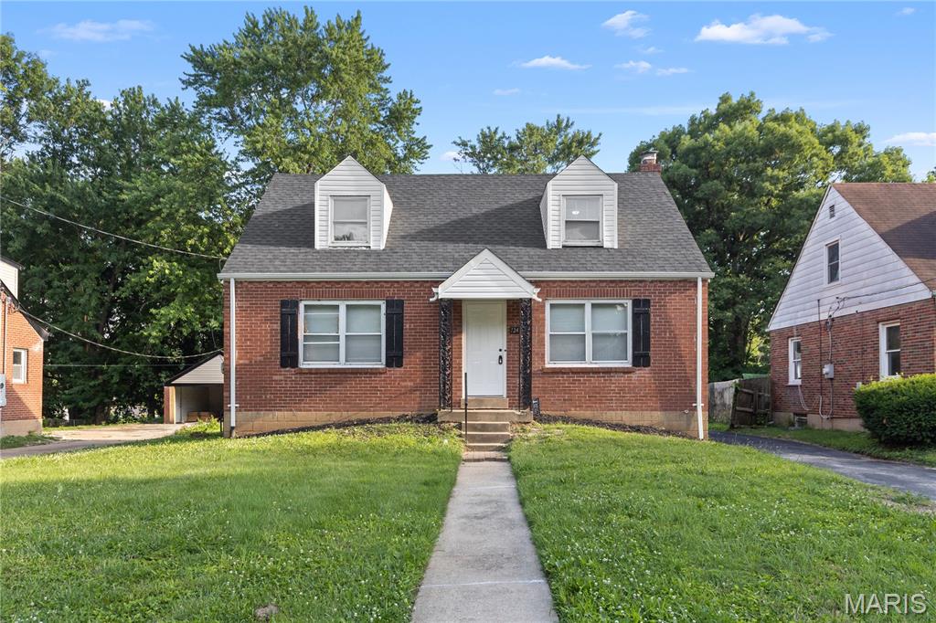 Charming all brick two story home that has been thoughtfully updated throughout and is move in ready. This solid home blends classic character with modern finishes, offering comfortable living space inside and a generous lot outside.
Step into a bright living room with fresh neutral paint, durable wood look flooring, and an arched entry that flows into the dining area and kitchen. The completely renovated kitchen is a standout, featuring crisp white shaker cabinets, granite countertops, a deep single basin sink with a black spring faucet, and a full stainless steel appliance package including range, dishwasher, and refrigerator. A side entry off the kitchen adds everyday convenience.
The main level offers a bedrooms and a stylish full bath with a double vanity, framed mirrors, modern black fixtures, and a tub surround with classic white subway tile. Upstairs you will find 2 additional bedroom spaces with vaulted ceilings, soft carpet, a ceiling fan, and a second full bath finished with a tiled walk in shower, marble look flooring, and a rainfall shower head.
Major updates throughout mean you can move right in. Outside, the home sits on a deep lot with a long private driveway, a detached brick garage and A new rear deck and stair landing complete the package.
This won't last long! Schedule your showing today!